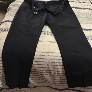 Black ankle length pants suitable for any occasion.